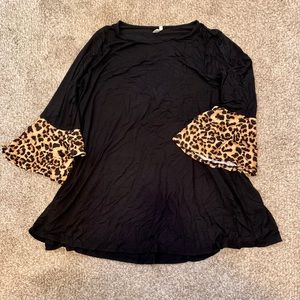 Black tunic length shirt with leopard sleeves
